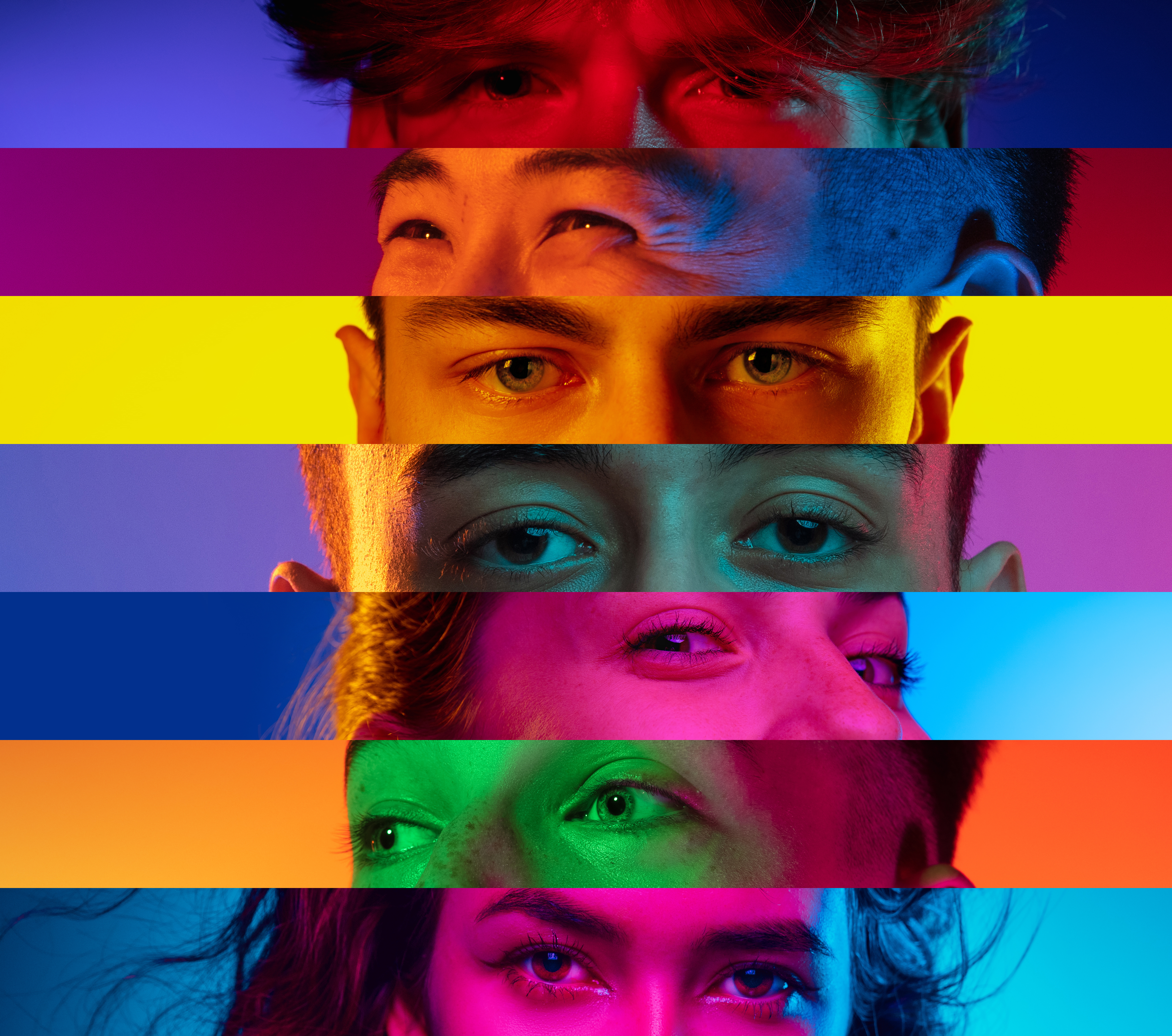 A collage of eyes from different people, each sectioned with vibrant, multicolored horizontal stripes, creating a striking and diverse visual effect.