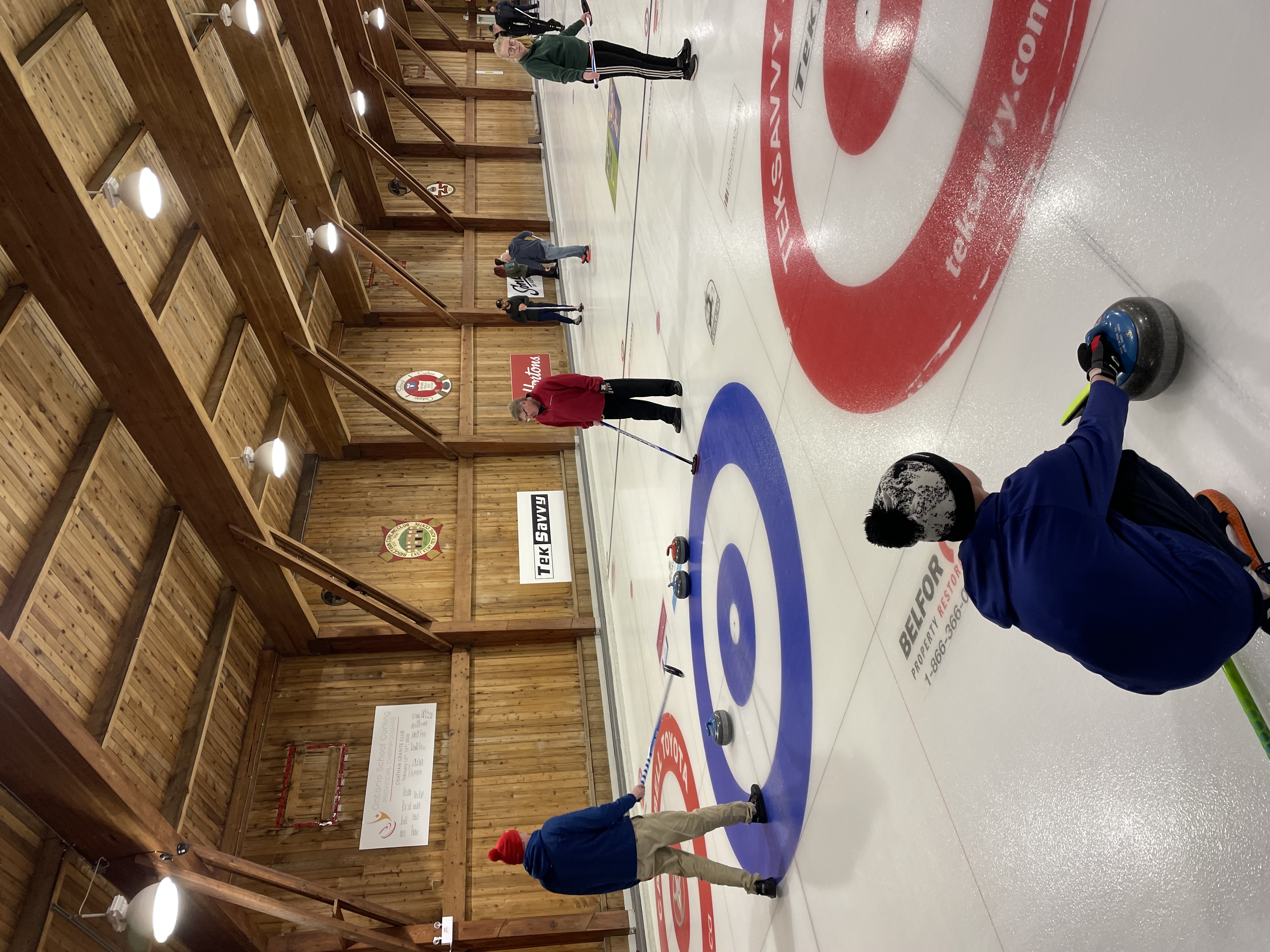 curling 3 people curling